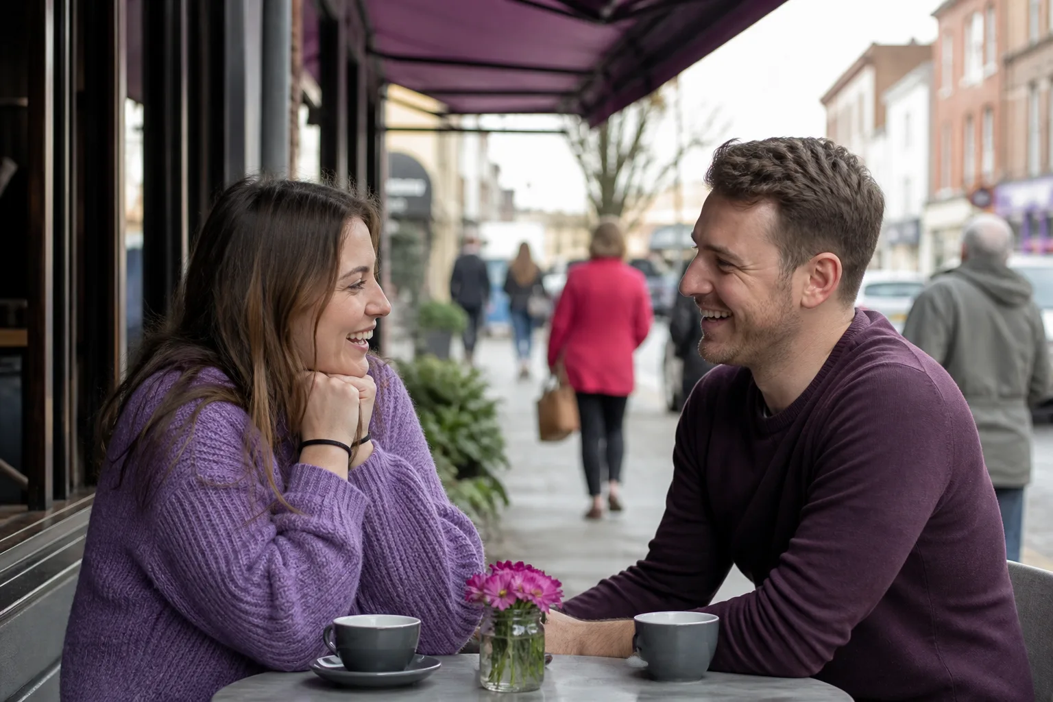 Two people talking beside Brayford Pool in Lincoln